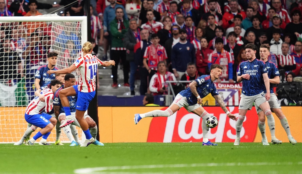 A shot from Atletico Madrid’s Marcos Llorente hits the hand of Arsenal’s Ben White resulting in a penalty (PA)