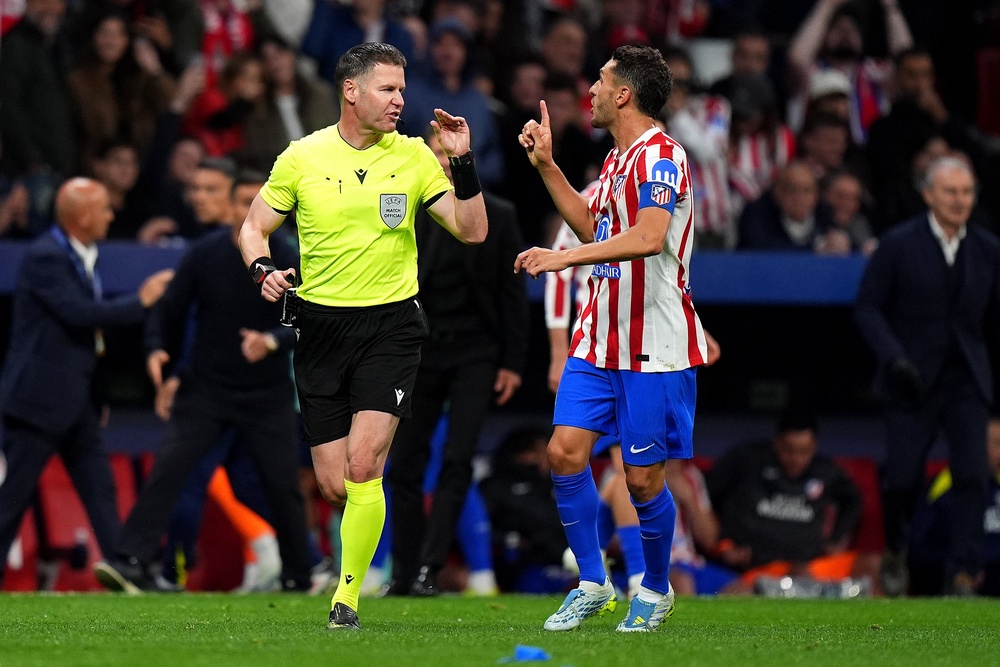 The referee changed his decision after originally giving Arsenal a penalty (Getty)