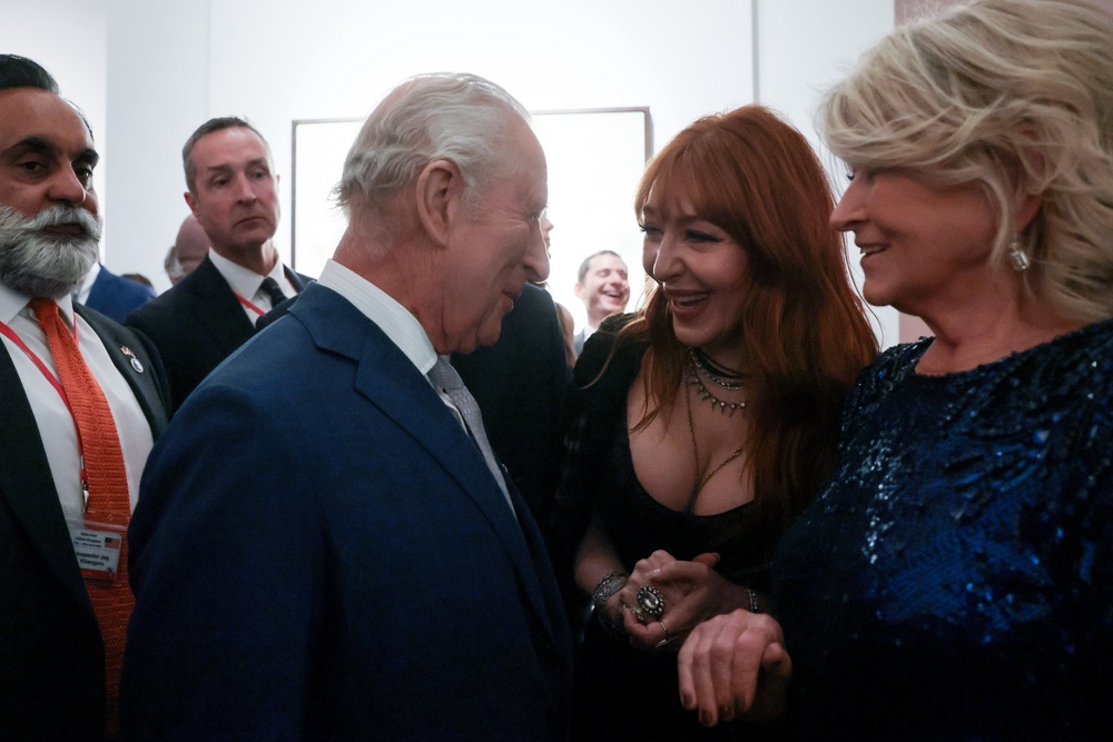 The King speaking to Charlotte Tilbury and Martha Stewartt (Getty)