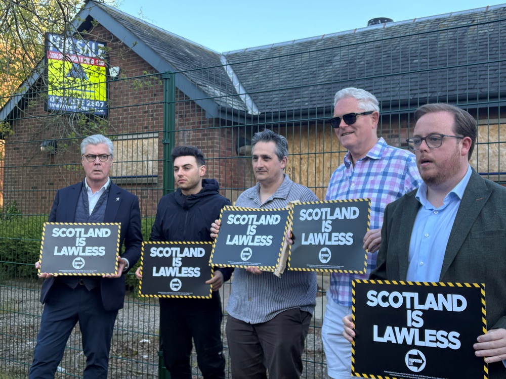Reform UK Scottish leader Malcolm Offord (left) and candidate Thomas Kerr (right) campaigned in Castlmilk in Glasgow, where the police station has been closed down. (Katrine Bussey/PA)