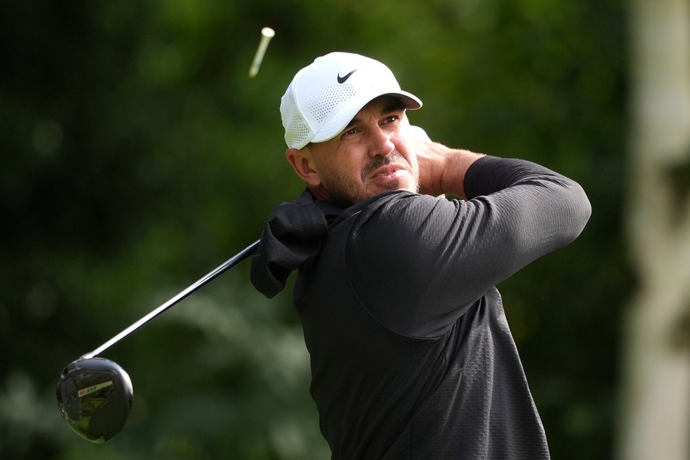 Brooks Koepka played a round with some of the England stars (Brian Lawless/PA)