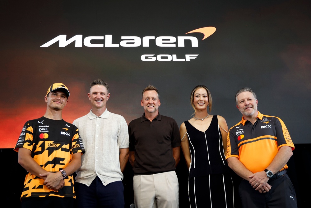 Lando Norris (far-left) poses with Justin Rose (centre-left), Ian Poulter (centre), Michelle Wie (centre-right) and Zak Brown at McLaren's golf launch event on Wednesday (Getty)