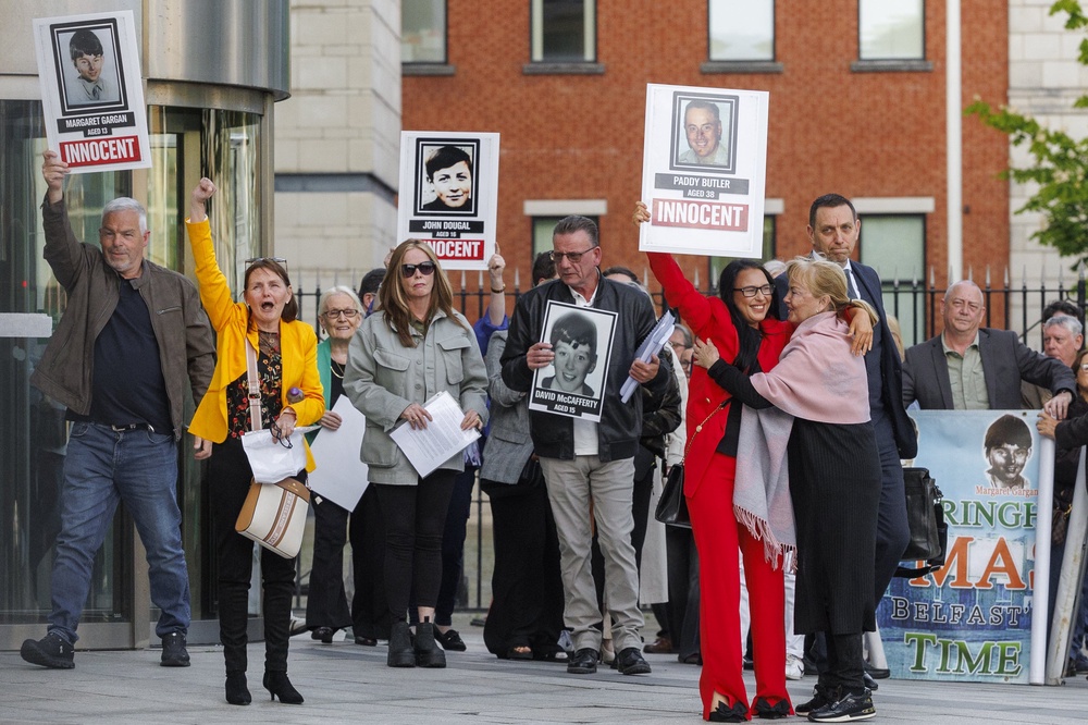 Natasha Butler with relatives of those killed during the Springhill Westrock shootings outside Belfast Coroner’s Court (Liam McBurney/PA) (PA Wire)