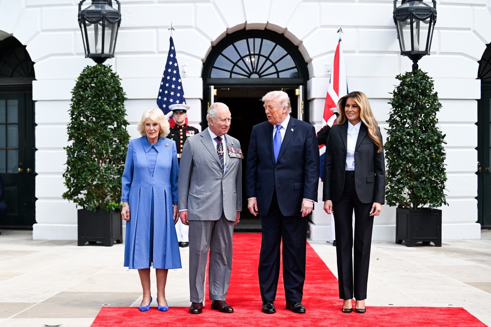 US President Donald Trump and first lady Melania Trump bid farewell to the King and Queen outside the White House in Washington DC (Samir Hussein/PA) (PA Wire)