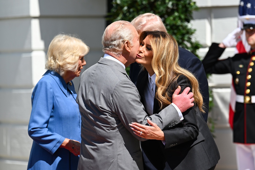 US President Donald Trump (behind) and first lady Melania Trump (right) bid farewell to the King and Queen (Samir Hussein/PA) (PA Wire)