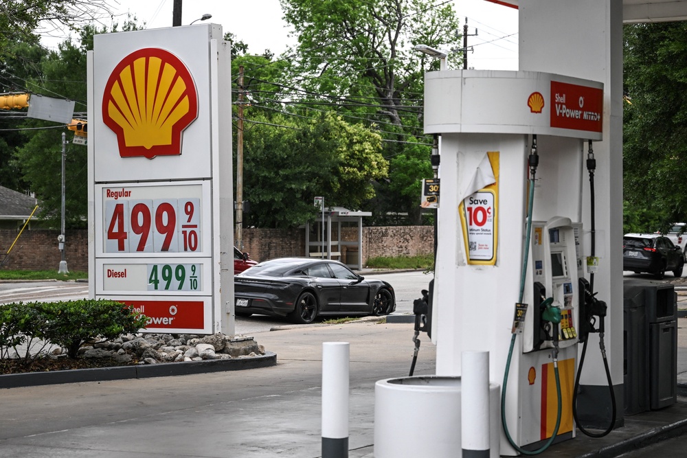 Financial strain caused by high gas prices is causing some Americans to reign in their spending on fast-food. Wingstop blamed an 8.7 percent first quarter sales decrease on the spike in fuel costs caused by the war in Iran (AFP/Getty)