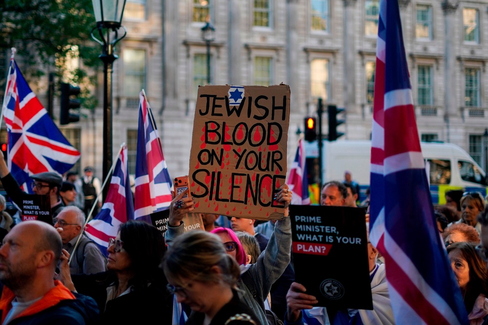 Protesters gather near Downing Street on Thursday during a ‘national emergency’ rally organised by the Campaign Against Antisemitism (AP)