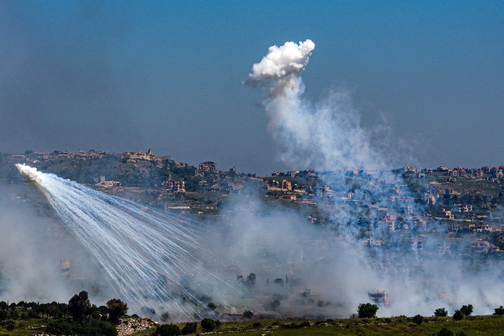 An explosion of what appears to be white phosphorus fired by the IDF on the Lebanese side of the Israel-Lebanon border as seen from the Israeli side of the border, April 30 (Reuters)