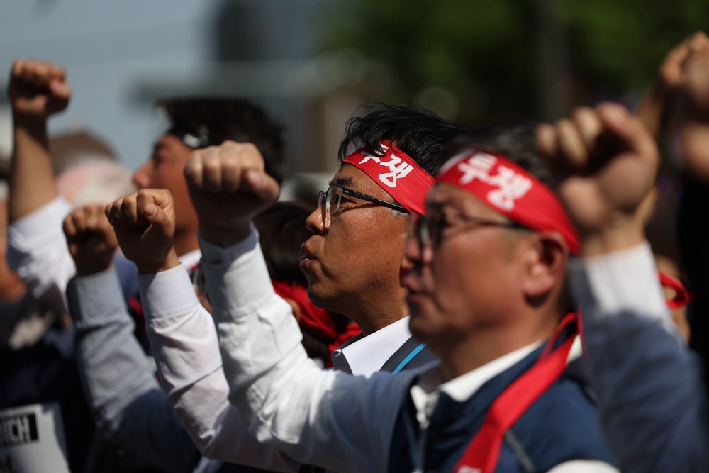 Members of the Korean Confederation of Trade Unions (KCTU) paricipate in a May Day rally (Getty)