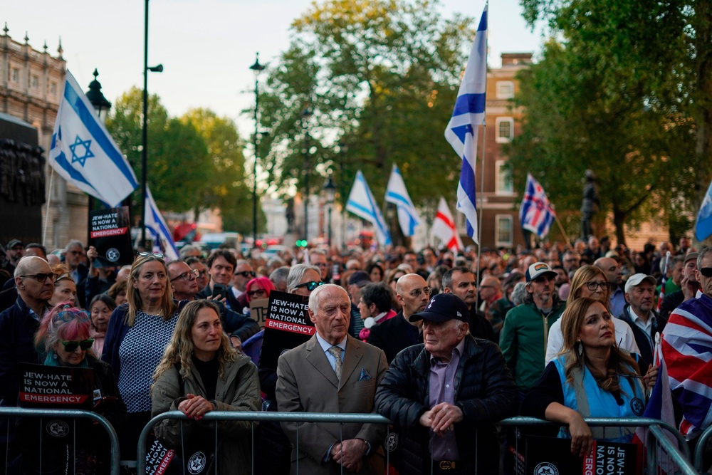 Protesters waved Israeli and British flags (AP)