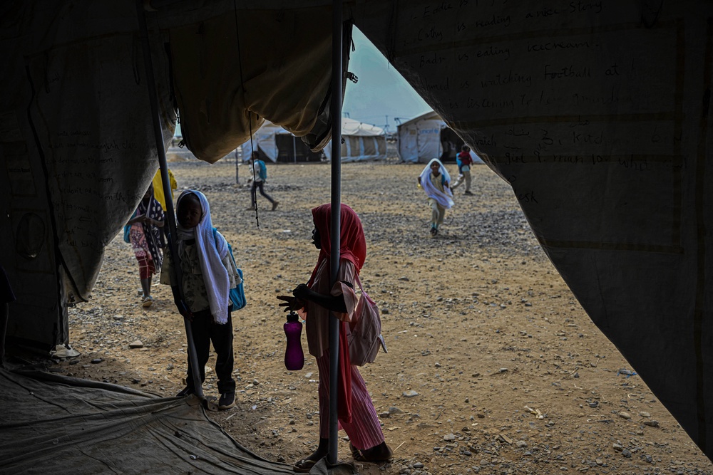 Displaced Sudanese students attend a class at an elementary school run by the Sudanese Coalition for Education in partnership with the United Nations International Children's Emergency Fund (UNICEF), south of Port Sudan, on April 26 (AFP/Getty)
