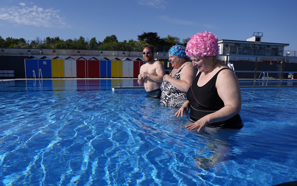 People swim at Hilsea Lido, one of Portsmouth’s most loved community landmarks (Andrew Matthews/PA) (PA Wire)