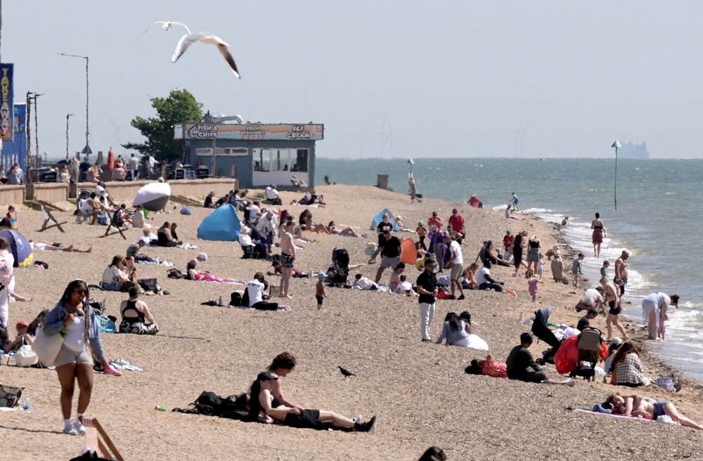 People enjoy the weather on Jubilee Beach in Southend (Stefan Rousseau/PA) (PA Wire)