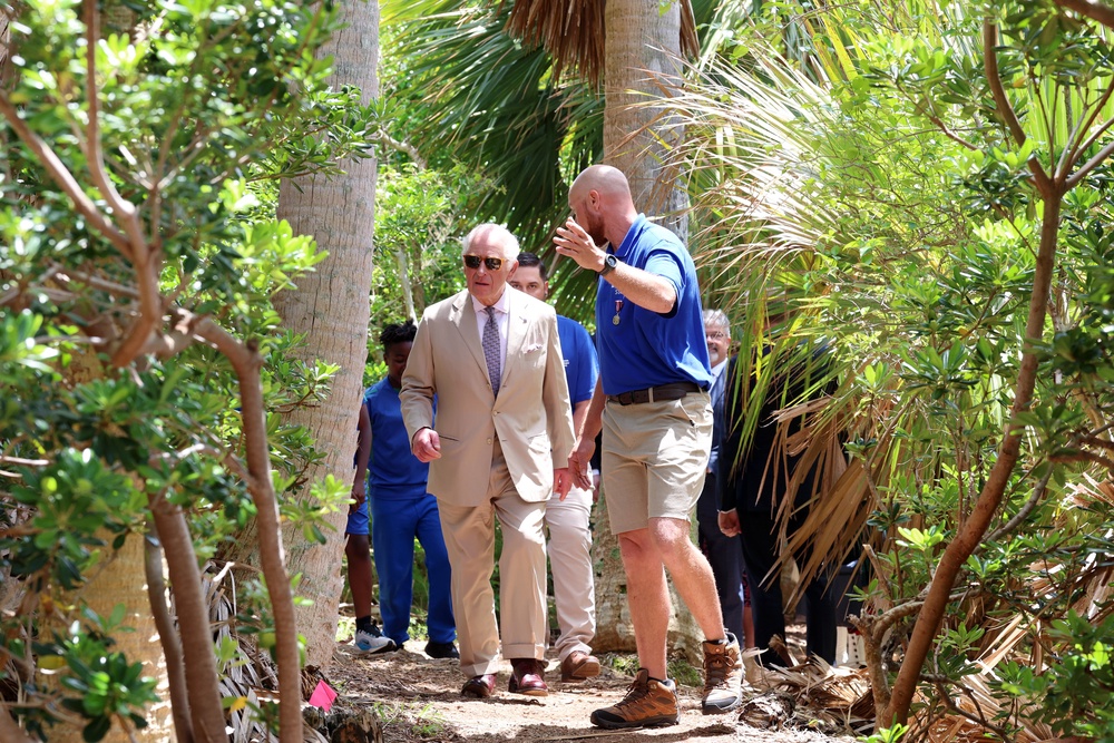 The King walks in the Palmetto Forest during a visit to Trunk Island’s Living Classroom, an initiative to enrich young people’s understanding of the island’s ecosystem (Chris Jackson/PA) (PA Wire)