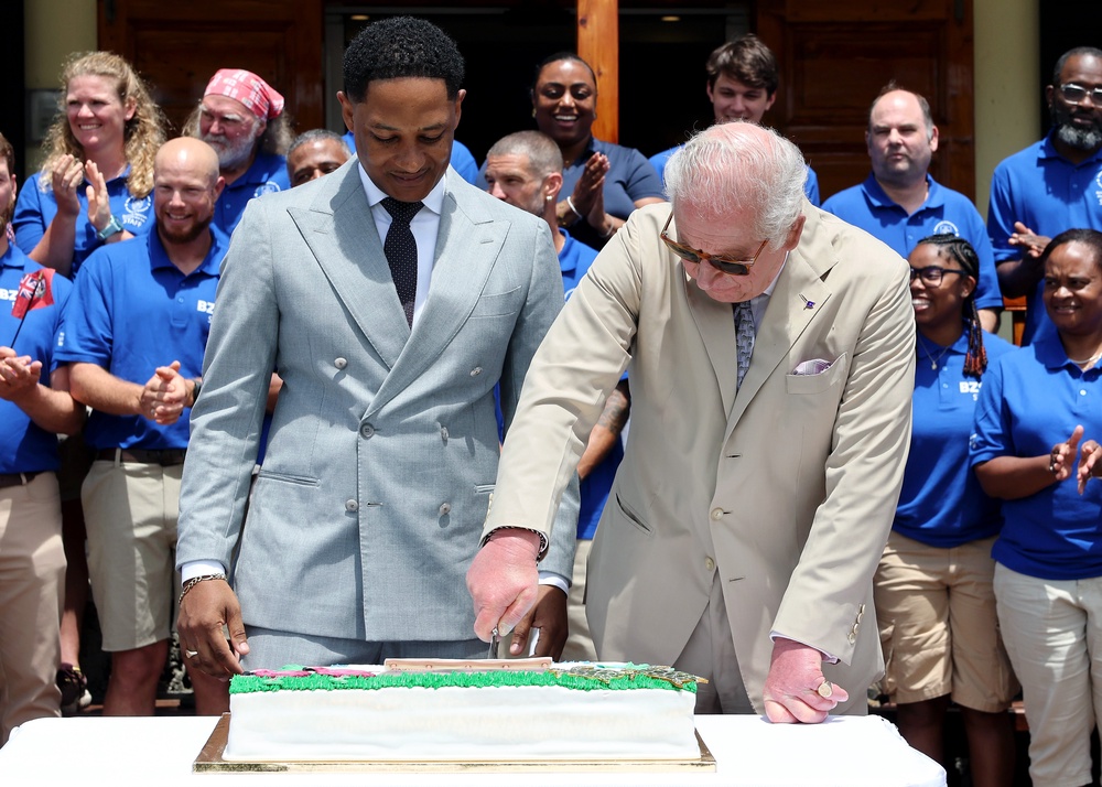 The King cuts a cake to mark the centenary of the Bermuda Aquarium Museum (Chris Jackson/PA) (PA Wire)