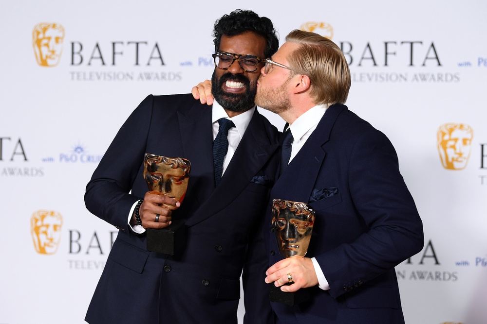 Romesh Ranganathan and Rob Beckett pose with the Entertainment Performance Award at the 2024 Baftas (Getty Images)