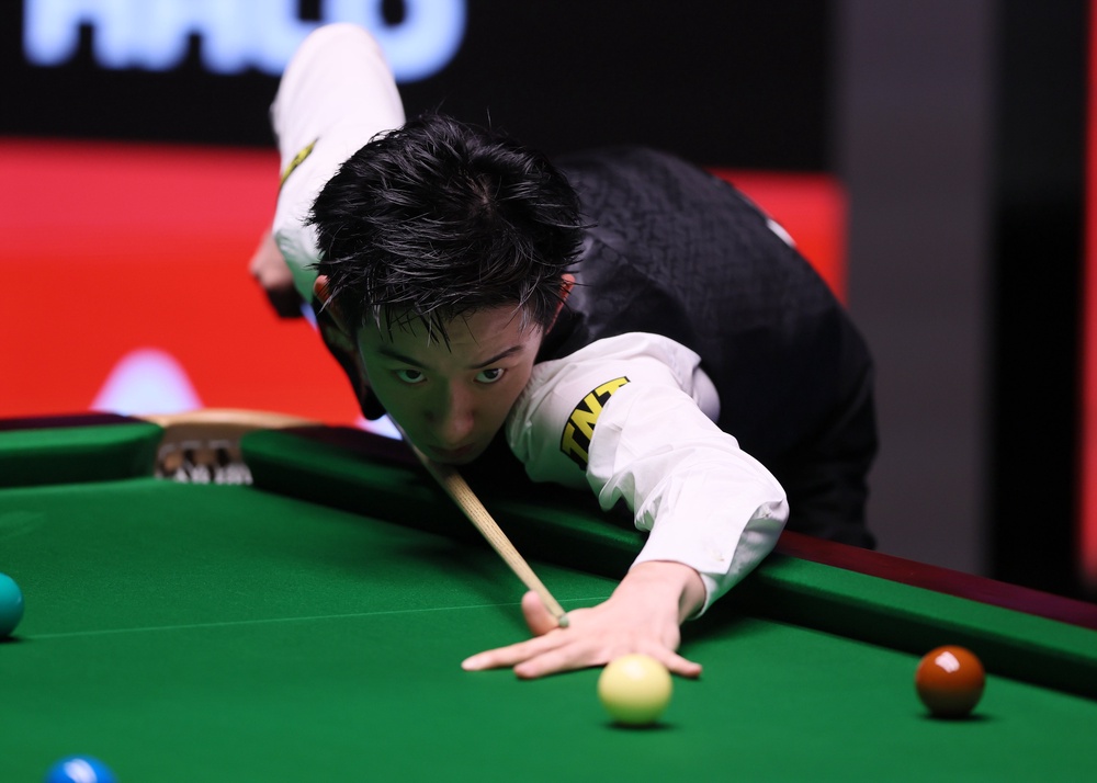 Wu Yize in action in the semi-final (PA)