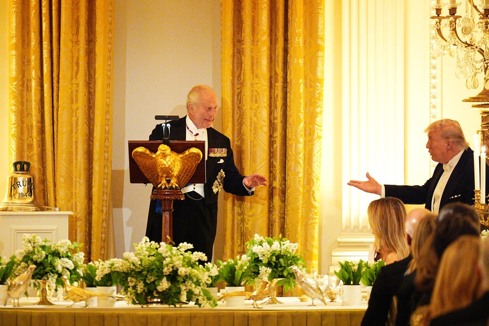 Charles presents Donald Trump with the bell from HMS Trump at the state dinner at the White House (Aaron Chown/PA) (PA Wire)