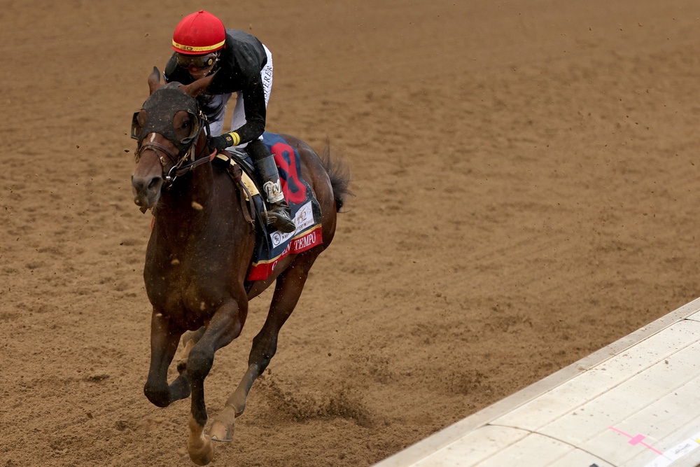 Golden Tempo, ridden by jockey Jose Ortiz, heads into the first turn (Getty)