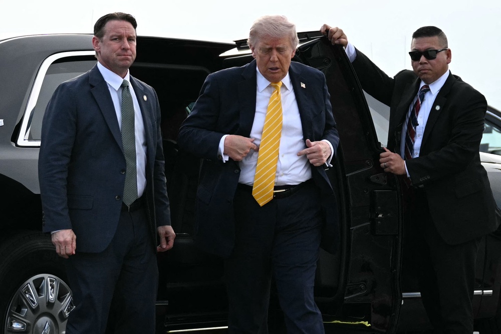 US president Donald Trump arrives at Palm Beach International Airport in West Palm Beach, Florida (AFP/Getty)