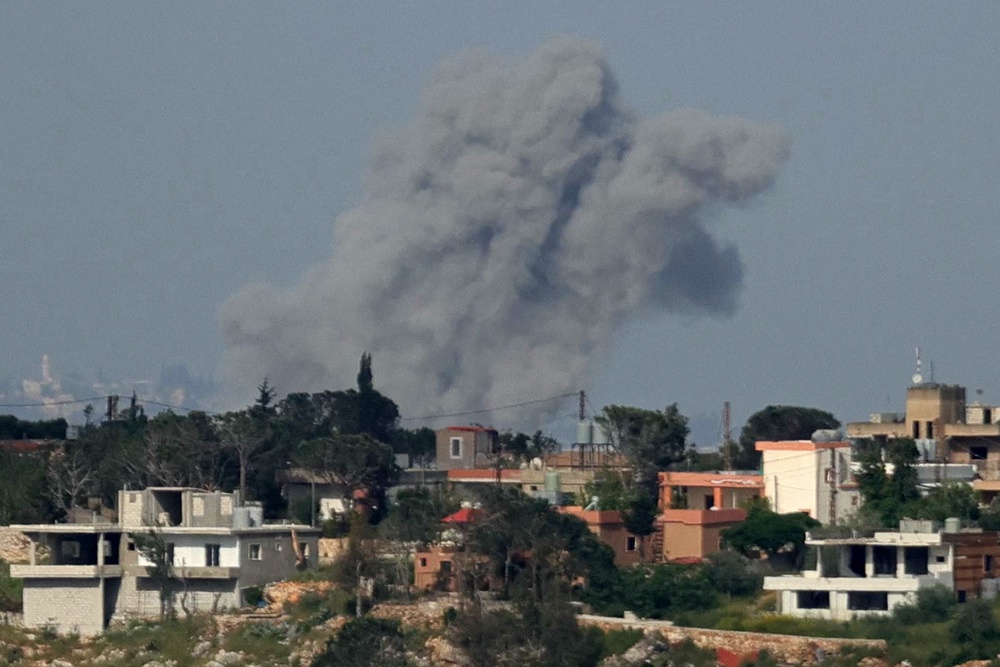 This photograph taken from the southern Lebanese area of Marjayoun shows smoke rising from the site of Israeli airstrikes that targeted the village of Zawtar al-Sharqiya (AFP/Getty)