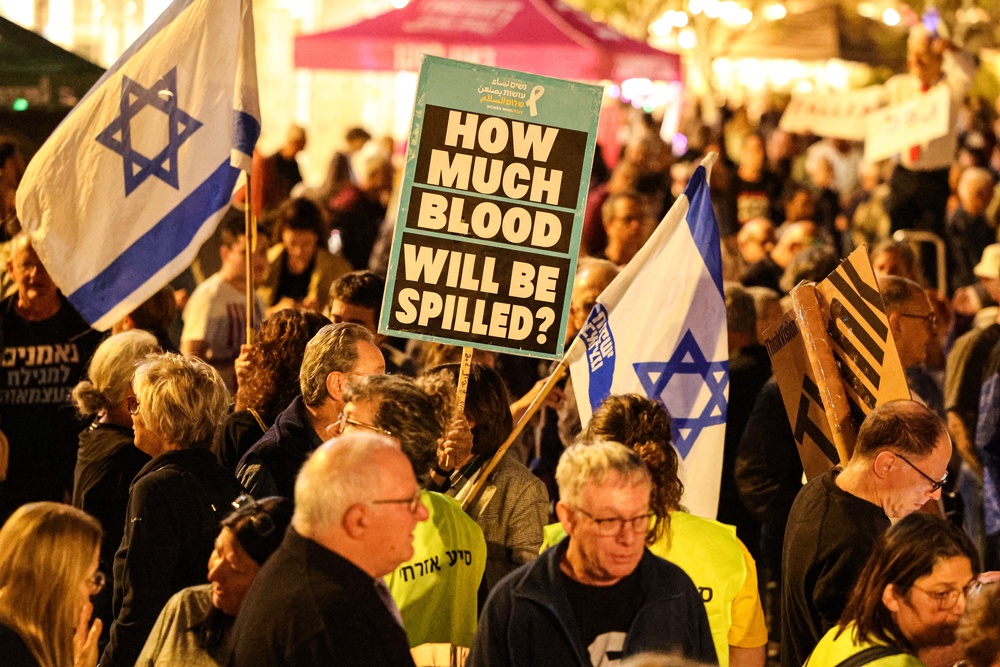 Israeli left-wing activists demonstrate in HaBima Square against the ongoing war with Iran and against the Israeli government in Tel Aviv on May 2 (AFP/Getty)
