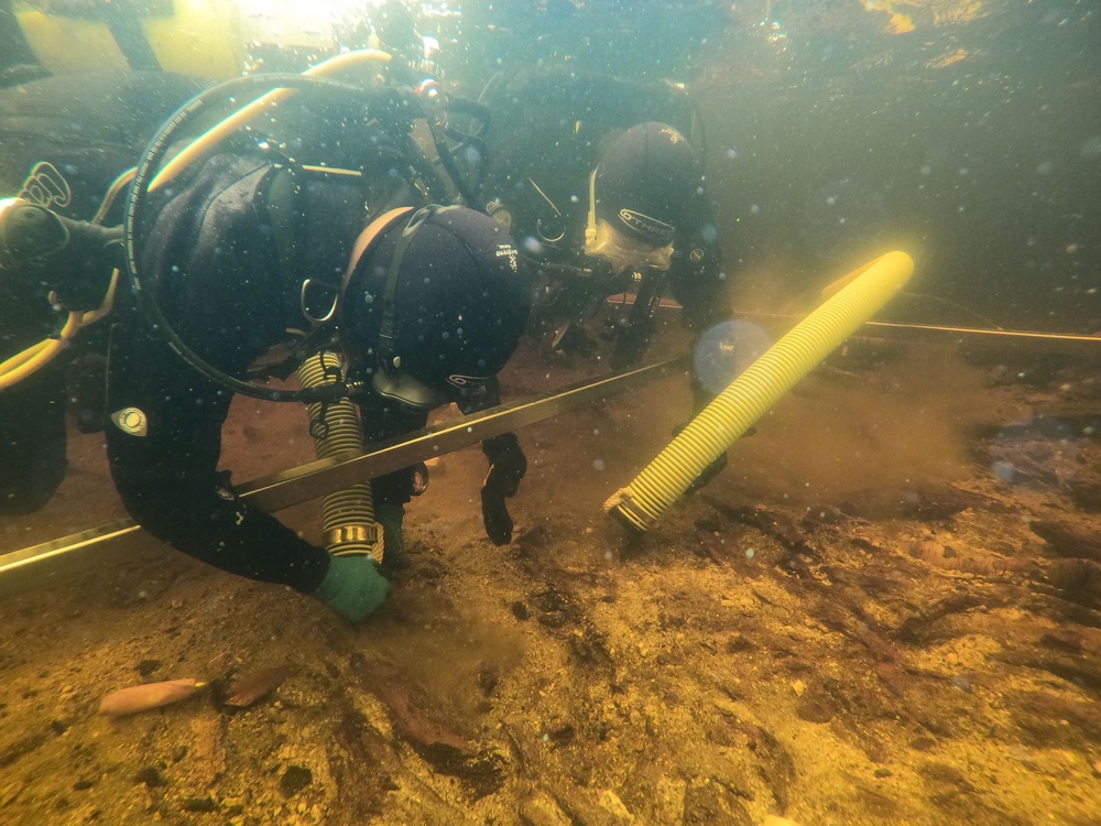 Excavating underwater at Loch Bhorgastail on the Isle of Lewis (University of Southampton/PA Wire)