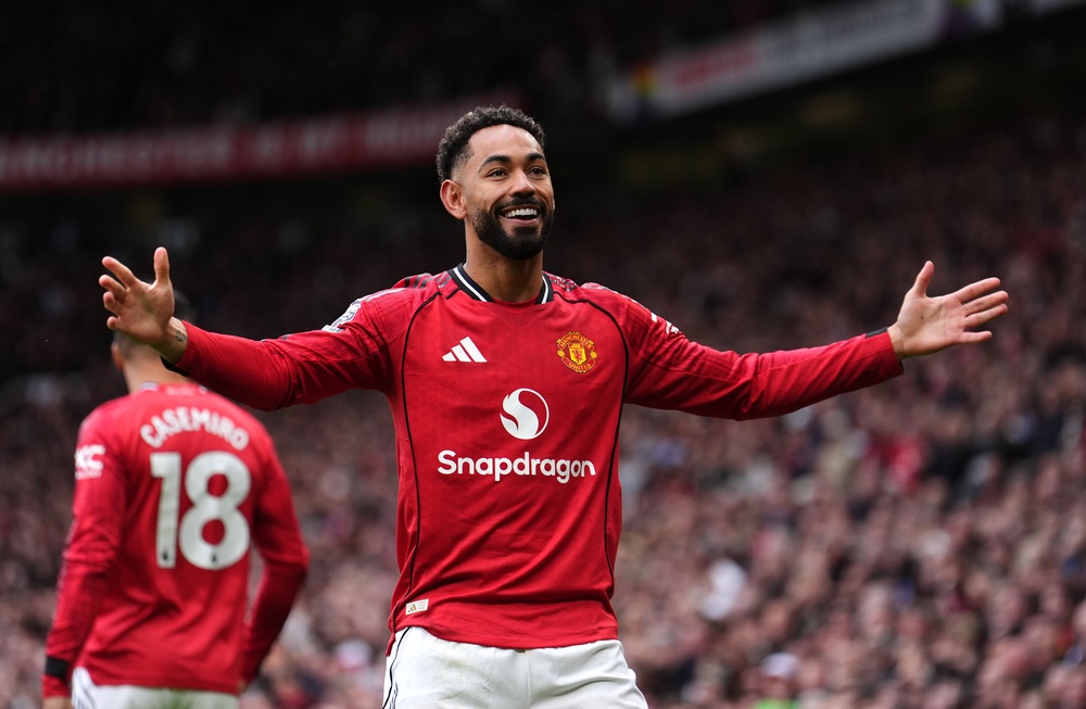 Matheus Cunha celebrates giving Manchester United an early lead against Liverpool at Old Trafford (Martin Rickett/PA). (PA Wire)
