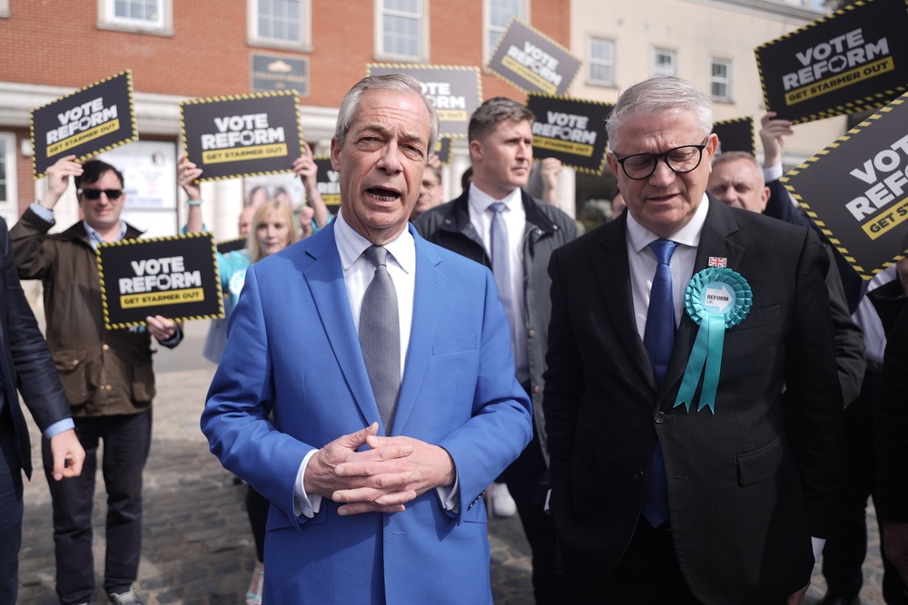Andrew Rosindell (right) with Nigel Farage in Romford in April (PA)