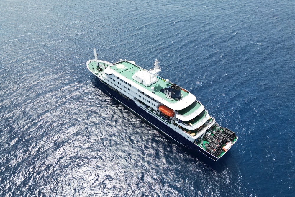 The MV Hondius stationary off the port of Praia, the capital of Cape Verde, on May 4, 2026. A suspected hantavirus outbreak on the ship has forced the passengers and crew into isolation (AFP/Getty)