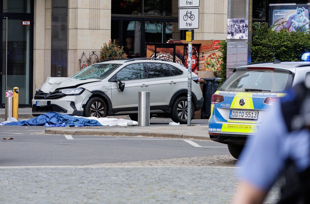 The damaged car at the scene of the incident on Monday (AFP/Getty)