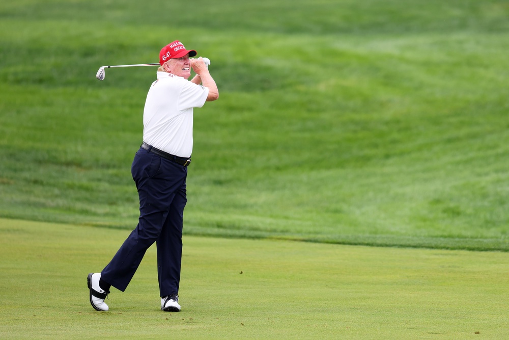An online tracker of Trump’s golf outings estimated the president has spent 124 of his 559 days in office golfing (Getty)