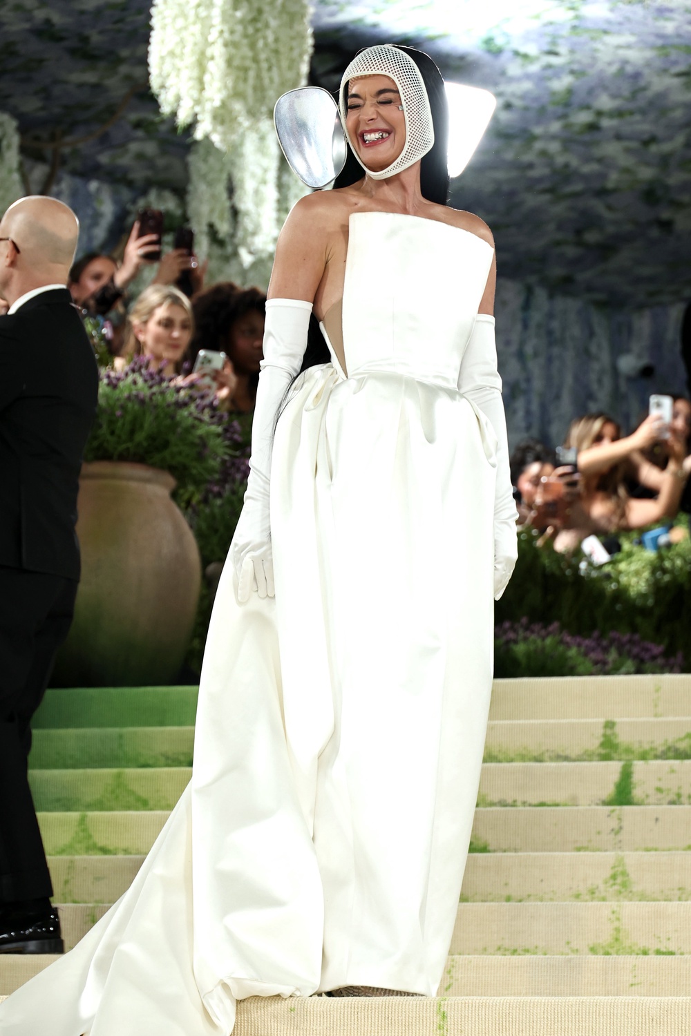 Surprise! Katy Perry appears from behind the mask (Getty)