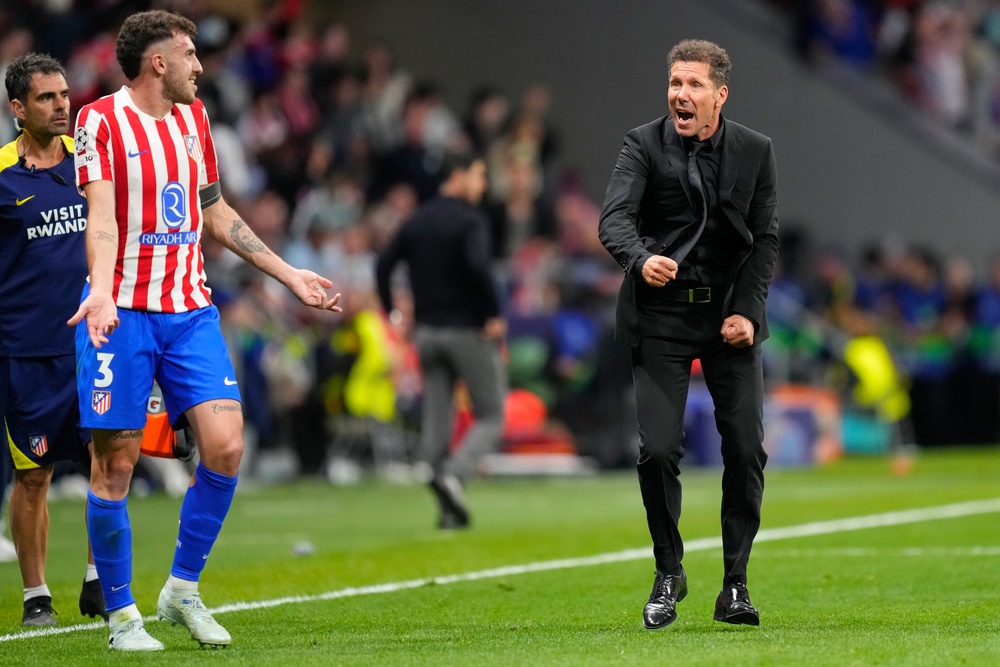 Arsenal accused Simeone of provoking the referee during the on-pitch review of the Eze penalty incident (AP)