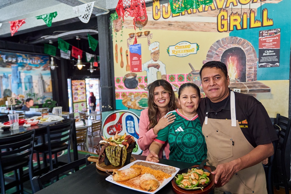 Chef Marco Mendoza, right, his wife Maria Luisa Mendoza, center, and daughter Nayomie Mendoza, pose for a picture at their Mexican restaurant Cuernavaca's Grill in downtown Los Angeles, (Copyright 2026 The Associated Press. All rights reserved.)