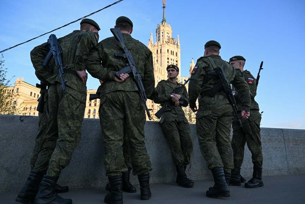 Russian servicemen await the rehearsal of the Victory Day military parade to be held at Red Square in central Moscow (AFP/Getty)
