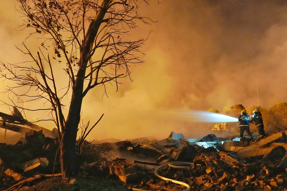 Firefighters work to extinguish a fire following a blast at a fireworks manufacturing factory in Liuyang, Hunan province, China, 5 May 2026 (Reuters)
