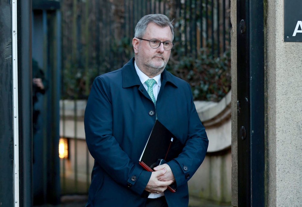Sir Jeffrey Donaldson leaves Newry Crown Court at an earlier hearing last year (PA) (PA Archive)