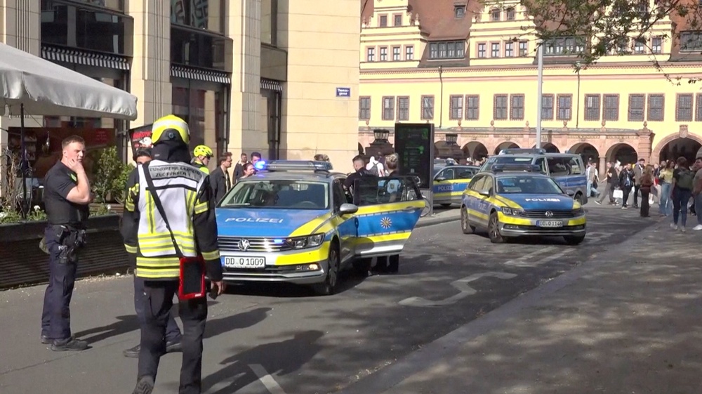 Police officers gather after a car ran into a crowd, in Leipzig, Germany, May 4 (Reuters)