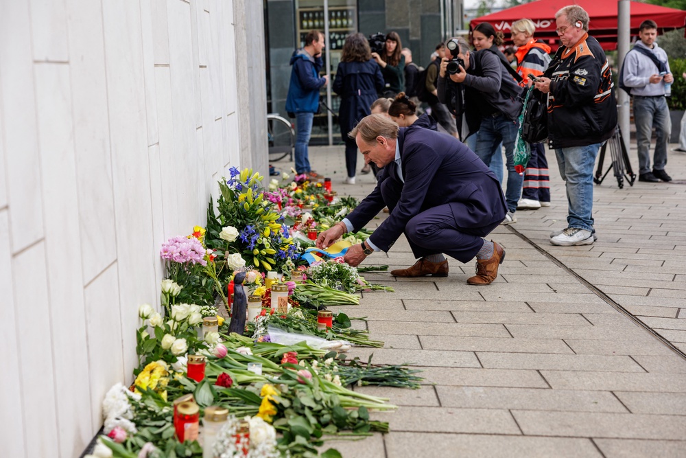 The mayor of Leipzig Burkhard Jung lays a wreath for the victims at a makeshift memorial on Tuesday (AFP/Getty)