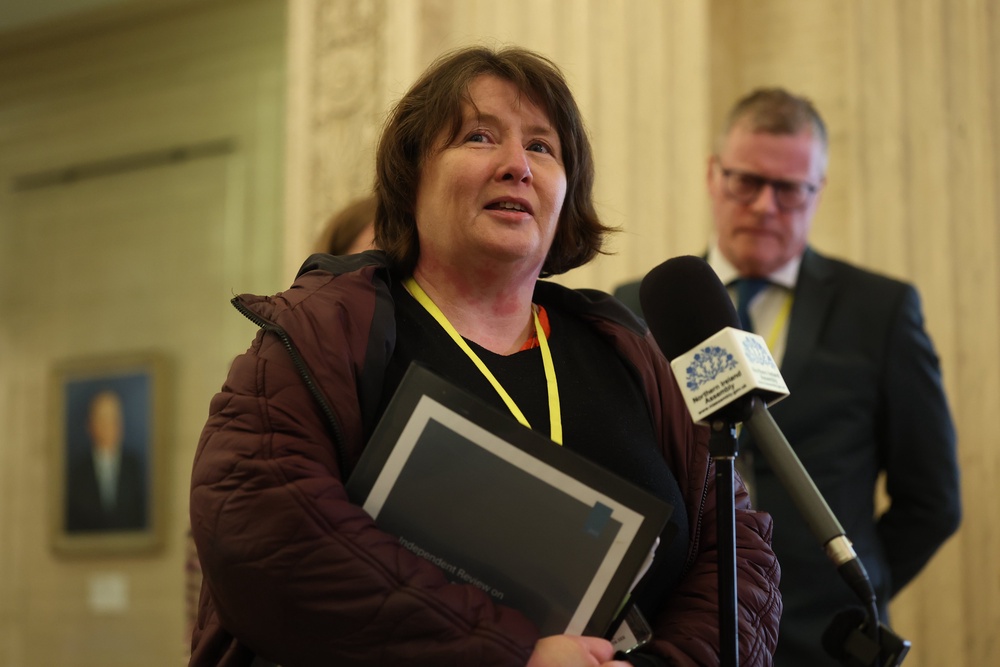 Noeleen Mullan speaks to the media in the Great Hall at Parliament Buildings (Liam McBurney/PA) (PA Wire)