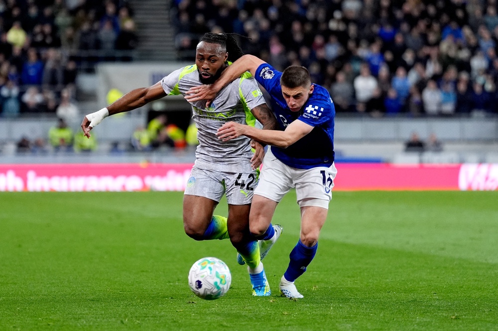 City’s Antoine Semenyo (left) competes for the ball with Everton’s Vitaliy Mykolenko (PA)