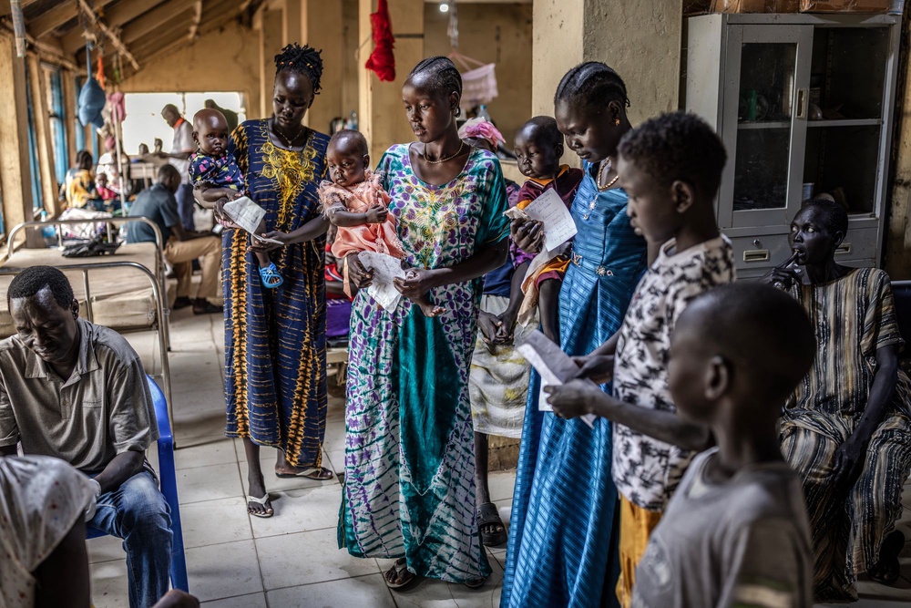 Mothers gather with their babies for medical treatment in South Sudan (AFP via Getty Images)
