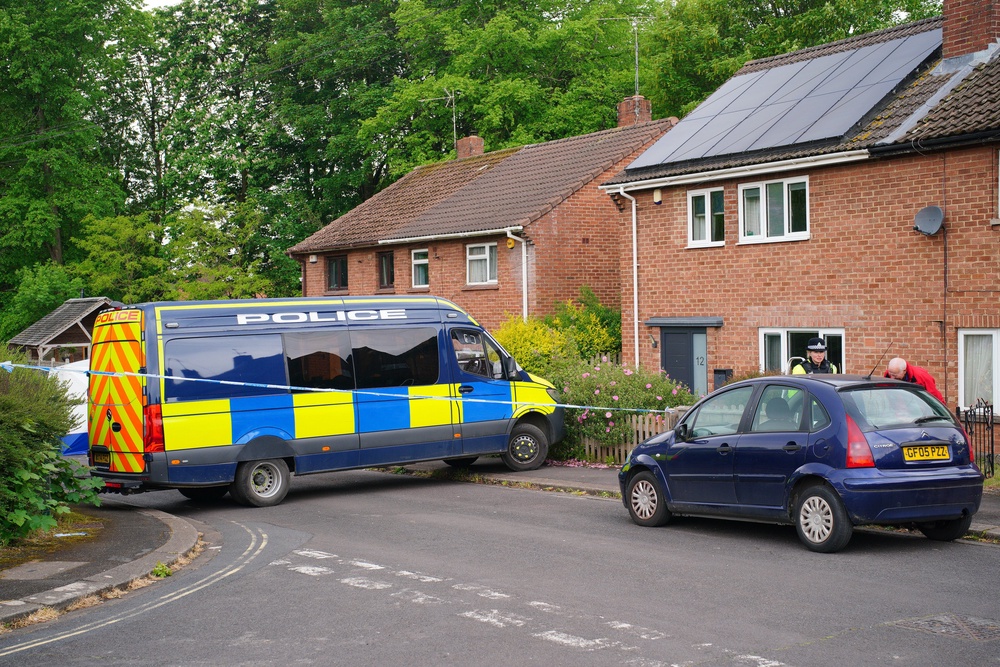 Emergency services remain at the scene, where a man and a woman died and three people, including a child, were taken to hospital following a “suspicious” explosion (Ben Birchall/PA) (PA Wire)
