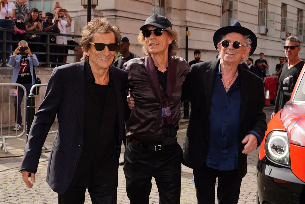 Ronnie Wood, Sir Mick Jagger and Keith Richards revealed their excitement over their next project (Ian West/PA) (PA Archive)