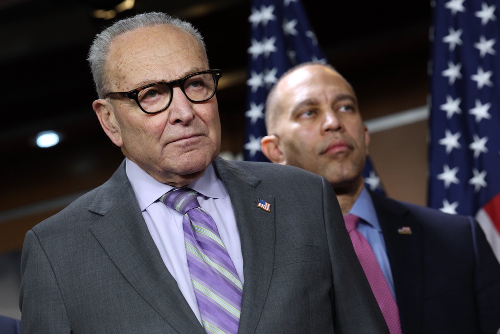 The White House shared an AI-generated image of Chuck Schumer and Hakeem Jeffries wearing sombreros and drinking margaritas with a sign that read, ‘I love illegal immigrants’ (Getty Images)