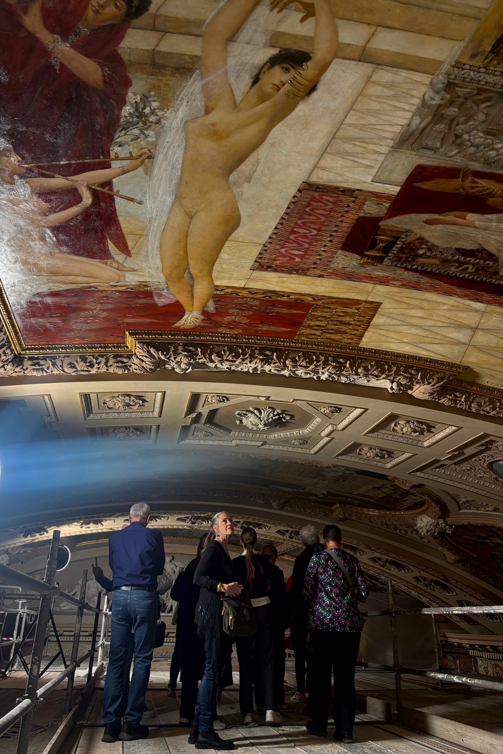 People attend a guided tour of the restoration of Gustav Klimt's ceiling paintings at the Burgtheater in Vienna, Austria (AP Photo/Philipp-Moritz Jenne)