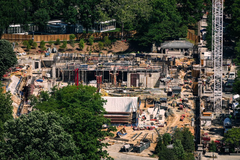 A site manager for the Washington, D.C.-based construction firm Clark Construction works out of a trailer on the grounds of the White House, and on some evenings is called into the Oval Office ‘to go over details’ with Trump ‘for more than an hour at a time’ (AP)