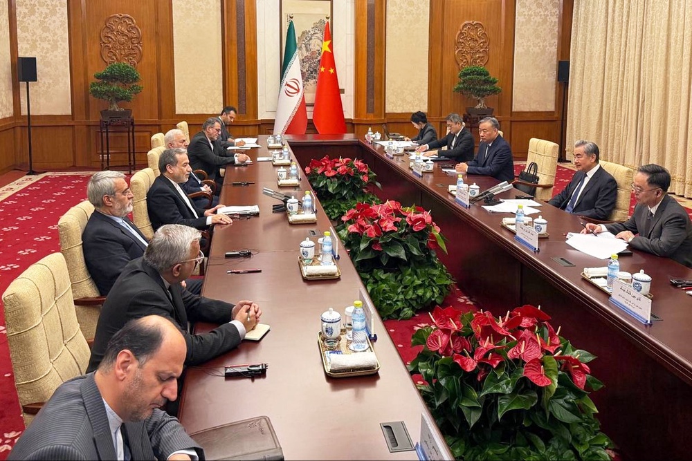 Iranian Foreign Minister Abbas Araghchi, China's Foreign Minister Wang Yi, second from right, meets with Iran's Foreign Minister Abbas Araghchi, center left, and their delegations in Beijing, China (AP)