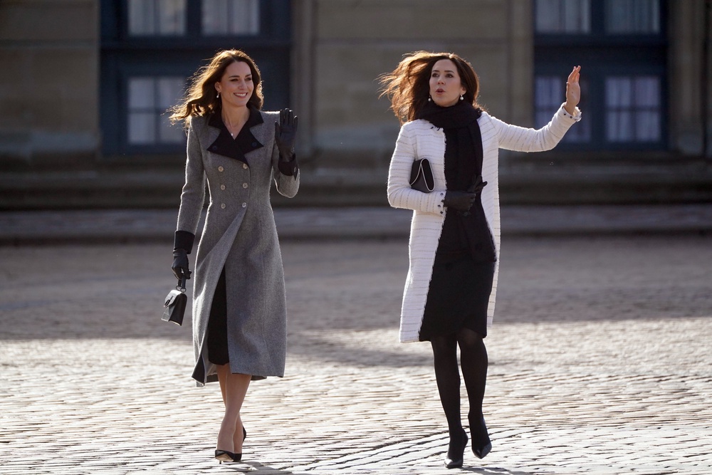 Kate and Princess Mary of Denmark walking across the courtyard at Amalienborg, the home of the Danish royal family (PA) (PA Archive)